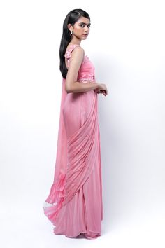 Rose pink concept pre-draped skirt saree with detachable pallu. Paired with thread, bead, 3D petal, sequin, pipe bead, pearl and zardozi embellished padded blouse. - Aza Fashions Pre-draped Georgette Wedding Dress, Fitted Bollywood Style Pre-draped Chiffon Saree, Bollywood Style Fitted Pre-draped Chiffon Saree, Chiffon Dress With Traditional Drape For Diwali, Silk Draped Sharara For Wedding, Draped Silk Sharara For Wedding, Bollywood Draped Dresses For Diwali, Wedding Silk Draped Sharara, Pink Draped Fitted Gown