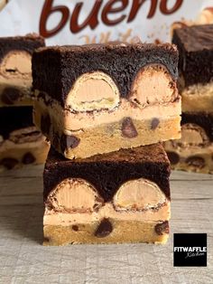 three pieces of chocolate peanut butter cookie bars stacked on top of each other