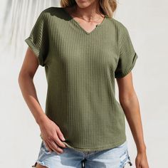 Step into comfort and style with our Olive Green Waffle Knit Tee. Crafted from a cozy waffle knit fabric, this tee offers a relaxed fit that's perfect for casual days. Upgrade your casual wardrobe with the cozy charm of our Olive Green Waffle Knit Tee. Enjoy the softness of the fabric, the relaxed fit, and the understated style that makes this tee a go-to piece for days when comfort is key. Product code: LAA04C4A001HH Relaxed Fit Solid Color Knit Tops, Chic Waffle Knit V-neck Top, Spring Casual Waffle Knit Tops, Casual Waffle Knit Tops For Spring, Solid Waffle Knit Tops, Waffle Knit Relaxed Fit Tops For Spring, Trendy Waffle Knit Tops For Day Out, Trendy Relaxed Fit Waffle Knit Tops, Textured Knit V-neck Top For Day Out