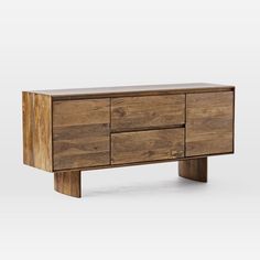 the sideboard is made from wood and has four drawers