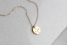 "Compass Necklace, Necklaces for Women, Silver, Rose or Gold Necklace This classic design is stamped by hand with a compass in gold, silver or rose options. The compass is a symbol of independence and finding your direction Perfect as a reminder for yourself or as a gift! D E T A I L S -13mm disc hand stamped just for you with a compass -A high quality delicate link chain -Disc and necklace are 14kt Gold-Filled or Sterling Silver - not plated -Water Resistant LENGTH - Please select from the drop Elegant Compass Design Necklaces As Gift, Elegant Necklace With Compass Design For Gift, Minimalist Compass Design Necklace As Gift, Minimalist Compass Design Jewelry As Gift, Elegant Compass Design Jewelry Gift, Rose Gold Compass Design Necklace For Gift, Gold Minimalist Compass Design Jewelry, Minimalist Gold Compass Design Jewelry, Rose Gold Necklace With Compass Design For Gift