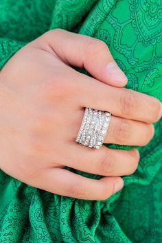 Row after row of radiantly mismatched white rhinestones and glistening silver bands haphazardly stack across the finger, coalescing into a dramatic display of dazzle. Features a stretchy band for a flexible fit. Sold as one individual ring. Silver Bands, Life Of The Party, Party Rings, Rhinestone Ring, Paparazzi Accessories, Blue Gems, White Rhinestone, Paparazzi Jewelry, Blue Necklace