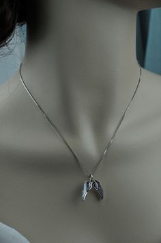 **Made of  925 sterling silver - safe for those with an allergy. Necklace and wing are made of 925 sterling silver, included complete set of wing(1 left, 1 right) as show in the picture.With Stamp S925 Size of each wing: 22mm x 8mmNecklace: 18 inches  These are ready to ship and will arrive in a box, ready for gifting, or to keep for yourself. Engraved Winged Sterling Silver Jewelry, Winged Sterling Silver Necklace For Gift, Nickel-free Sterling Silver Angel Wing Jewelry, Silver Angel Wings Jewelry Gift, Nickel-free Winged Sterling Silver Jewelry, Personalized Silver Wing-shaped Necklace, Silver Wing-shaped Sterling Silver Necklace, Silver Angel Wings Jewelry For Gift, Sterling Silver Angel Wings Pendant Jewelry