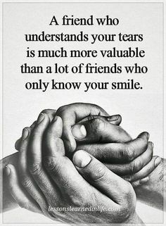 two hands holding each other with the words, a friend who understands your tears is much more valuable than a lot of friends who only know your smile