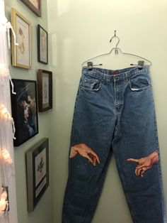 "~Baggy Jeans with hand-painted hands in the style of Michelangelo's \"the Creation of Adam\"~ ~brand of jeans: Faded Glory ~jeans are mens size 34/32 ~model is size 4 in women's pants. ~delicate or hand wash only (cold water only to not damage paint)" Customized Pants Jeans, Hand Painted Jeans Pants, Hand Painted Denim Jeans For Streetwear, Artistic Hand Painted Denim Bottoms, Artistic Hand Painted Denim Jeans, Painted Jeans Men, Painted Pants Idea, Painted Jeans Ideas, Jean Painting Ideas