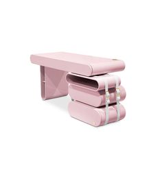 three pieces of pink furniture stacked on top of each other in the shape of rectangles