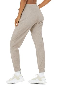 Total live-in material. The Muse Sweatpant takes comfort seriously—it’s made with a soft ribbed knit and has a relaxed silhouette, drawstring closure and pockets at side and back. Wear it with the matching hoodie or an easy tank. An iconic Alo fave So comfy & all-day cute Designed & uniquely fit to flatter every size Wear-tested by our in-house team for the perfect fit Alo Yoga® | Muse Sweatpant in Gravel Heather, Size: Medium Sporty Solid Ribbed Pants, Comfortable Alo Yoga Bottoms With Elastic Waistband, Alo Yoga Athleisure Loungewear Bottoms, Alo Yoga Solid Pants For Loungewear, Alo Yoga Stretch Bottoms For Loungewear, Alo Yoga Athleisure Pants For Loungewear, Alo Yoga Athleisure Bottoms For Loungewear, Alo Yoga Solid Color Pants For Loungewear, Stretch Alo Yoga Bottoms For Loungewear