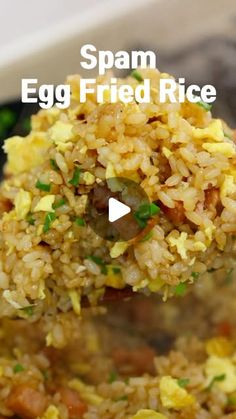 an egg fried rice dish is being held by a ladle with the words spam egg fried rice on it