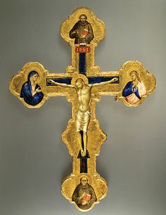 the crucifix is painted gold and blue