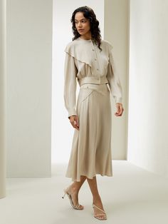 A mastery of movement, this breezy slip skirt uses lightweight and soft double joe silk to create a soft draping for extra flow with every step. Its delicate cut and appropriate length showcase a wrap detail at the waist, which permits you to enjoy a distinct and feminine elegance. Our easy midi-length style pairs seamlessly with a t-shirt for off-duty outings or a button-down blouse for a formal look. Beige Silk Skirt, Silk Pajamas Women, Silk Bedding Set, Silk Nightwear, Feminine Elegance, Silk Midi Skirt, Camisole Set, Beige Silk, Striped Midi Skirt