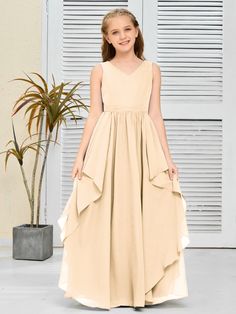 This Fantastic Chiffon Junior Bridesmaid Dress is designed with elegant chiffon fabric, which ensures it is lightweight and comfortable for young wearers. It is also made to be wrinkle-resistant, making it a great option for extended wear occasions like weddings or formal events. Young Bridesmaid Dresses, Dress Peach, Junior Bridesmaid Dress, Junior Bridesmaid Dresses, Junior Bridesmaid, Chiffon Fabric, Bridesmaid Dress, Formal Event, Bridesmaid Dresses