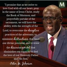 a man standing in front of a podium with a quote from pastor m johnson on it