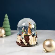 a snow globe sitting on top of a table