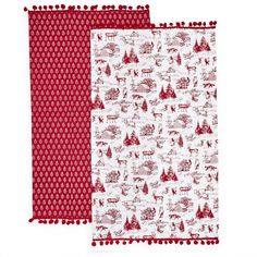 two pieces of red and white fabric with trees, deers and snowflakes on them