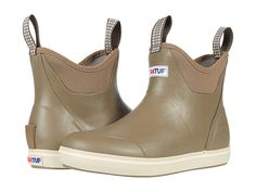 XTRATUF Ankle Deck Boot - Women's Shoes : Taupe : The XTRATUF Ankle Deck Boots are 100% waterproof and crafted specifically for sport and recreational fishermen. Please note: the brand recommends that if you are a half size to order up. Ex: If you are a size 7.5, order the size 8. Style numbers: XWAB-901 (Taupe), XWAB-900 (Brown), and XWAB-000 (Black). Boot is constructed with hand-layed rubber, so it is not commercial grade. Front and back pull-on tabs for easy boot entry. Breathable mesh linin