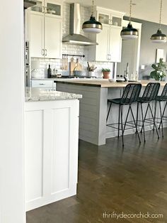 the kitchen is clean and ready to be used as a dining room or living room