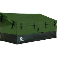 a large green box with black straps on it