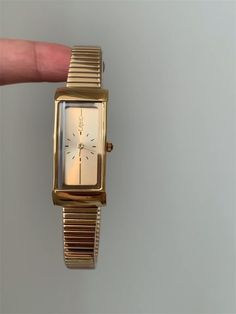 Welcome to AffordLuxe Watches! We're delighted to have you here in our store 🤩 This elegant rectangular watch, available in gold and silver, is the perfect timeless gift for him or her this Christmas. With its sleek design and durable stainless steel band, it adds a touch of sophistication to any outfit. Whether for a formal event or everyday wear, this unisex watch is a stylish choice that makes a thoughtful and versatile present for the holiday season. ★Material: - Stainless Steel  - Copper  - Glass ★Dimensions: - Case Height: 8mm - Case Width: 11mm - Case Length: 36mm - Band Width: 11mm - Band Length: 18cm ★Delivery:   To ensure a smooth and successful shopping experience, please provide us with your exact shipping address and phone number if possible. This will help us deliver your or Luxury Vintage Rectangular Watch Bands, Rectangular Watch, Gold And Silver Watch, Elegant Birthday, Copper Glass, Watches For Women, Unisex Watches, Timeless Gifts, Nail Polish Remover