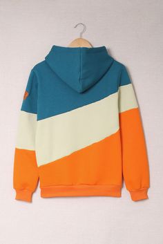 Orange Colorblock Cowl Neck Pullover Hoodie Sporty Sweatshirt With Color Matching For Fall, Sporty Fall Sweatshirt With Color Matching, Blue Hooded Hoodie With Contrast Color, Blue Hoodie With Contrast Color For Streetwear, Blue Contrast Color Hoodie For Fall, Sporty Color Block Hoodie, Blue Hoodie With Contrast Color For Winter, Sporty Cotton Color Block Hoodie, Casual Cotton Hoodie With Color Matching