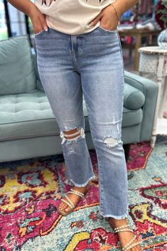 Get ready to elevate your style with LIVIA High Rise Crop Flare Jeans. These trendy jeans feature a flattering high rise fit and a flared leg that will elongate your silhouette. The light wash adds a touch of brightness to your look. Upgrade your denim game today! 74% Cotton, 24% Polyester, 2% Spandex Wash Separately. Hang to Dry. No Bleach. -Model is wearing a size 3. Rise 10.5" | Inseam 27" in Size 3 Perfect Jeans For Your Body Type, Best Jeans For Short Women, Jeans For Your Body Type, Crop Flare Jeans, Ripped Jeans Women, Crop Flare, Trendy Jeans, Cropped Flare Jeans, Jeans For Short Women