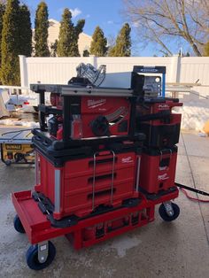 a red tool cart with tools on it