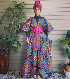 DESCRIPTION Elegant Ankara women's kimono with some sophisticated details.  High-quality African print fabric. No closure Ankle length African print fabric  Racer stripes detail COMES WITH A HEADWRAP AND BELT You may feel free to choose the size. Just send us your measurements (bust, waist, hips, height).  We will define your correct size. We are responsible for the suitable size. SIZES ABOVE US 22 WILL ATTRACT EXTRA COST SIZES   UK 4, US 1 EU 32  Bust : 30  Waist : 22.5  Hip: 32.5 UK 6, US 2 EU Black Floral Print Wrap Kimono, Black Printed Kimono With Kimono Sleeves, Black Printed Long Kimono, Black Printed Kaftan With Kimono Sleeves, Black Long Printed Kimono, Long Black Printed Kimono, Kimono Ankara, African Print Kimono, Ankara Kimono