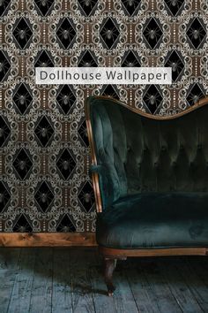 a green velvet couch sitting in front of a wallpaper pattern with the words dollhouse wallpaper on it