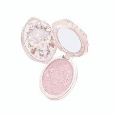 two pink compact mirrors sitting next to each other