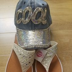 Hey Guys Welp "Summer" Is Finally Here. It's Time To Make Sure Your Wardrobe Has You Matching From Head To Toe . These Slides And Babeball Cap Are Sassy, And Flashy! The Silver Slides, Are Adorned With Different Shaped Faux Diamonds And The Baseball Cap Has The Word Cool Across The Top In Silver Sequence, And White Pearls. The Bid Of The Cap Has Silver Rainbow Sequence And Faux Diamond Studs. "Super Duper Cute" #Definitely%Certifiedchillready Ships Same Day Casual Sandals With Rhinestones And Round Toe, Casual Rhinestone Sandals With Round Toe, Casual Rhinestone Round Toe Sandals, Summer Sandals With Bling And Round Toe, Casual Rhinestone Sandals For Spring, Trendy Silver Sandals For The Beach, Summer Silver Sandals With Rhinestones, Silver Round Toe Sandals For Summer, Silver Sandals With Rhinestones For Summer