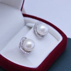 Treat yourself to timeless elegance with these 11-12mm Freshwater Pearl & Rose Floral Earrings from House of Pearls. Classically crafted from freshwater pearls, these earrings exude a classic charm that never goes out of style. The soft, rosy hue of the pearls gives them an added sense of allure, while the simple design keeps them versatile enough to wear it with almost any outfit. Perfect for casual or formal occasions, these timeless studs will add a hint of luxury to any ensemble. This popula Pearl Drop Earrings For Anniversary, Round Pearl Clip-on Earrings For Anniversary, Akoya Pearl Bridal Earrings Gift, Akoya Pearl Bridal Earrings Gift, Round Shape, Round Akoya Pearl Bridal Earrings As Gift, Pearl Rose, Freshwater Pearls Earrings, Pearl Types, Product Introduction