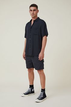 Cuban Short Sleeve Shirt Black Short Sleeve Shirt For Summer, Black Relaxed Fit Short Sleeve Shirt For Summer, Black Button-up Short Sleeve Shirt For Summer, Black Collared Camp Shirt For Summer, Black Short Sleeve Camp Shirt For Streetwear, Black Camp Shirt With Relaxed Fit, Black Casual Camp Shirt For Streetwear, Black Camp Collar Shirt With Relaxed Fit, Casual Black Camp Shirt For Streetwear