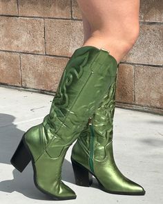 Stand out from the crowd with our Metallic Green Cowgirl Boots! These cute green western boots feature a 3.75" heel & intricate stitching that complements any outfit. Wear to your next concert, festival, rodeo or just because! Green Cowgirl Boots, Mini Tube Dress, Green Boots, Studded Denim, Denim Corset, Concert Festival, Corset Mini Dress, Halter Mini Dress, Denim Mini Dress