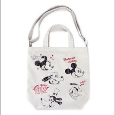 You'll Enjoy Toting Around Mickey And His Friends When You Carry This Cotton Canvas Bag. Vintage-Style Artwork Of Mickey, Minnie, Donald, Goofy, And Pluto Is Featured On One Side Of This Sturdy And Versatile Tote That Has Carry Handles And And Adjustable Shoulder Strap. Magic In The Details Distressed Screen Art Characters Include Mickey, Minnie, Donald, Goofy, And Pluto Embroidered "Forever Mickey," "Love Since 1928" Text, Plus Hearts Adjustable Shoulder Strap Top Carry Handles The Bare Necessi Disney Tote Bag, Goofy And Pluto, Disney Tote Bags, Disney Tote, Friend Canvas, Mickey Love, Disney Purse, Disney Bags, Disney Vintage