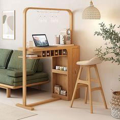 a living room with a couch, desk and mirror