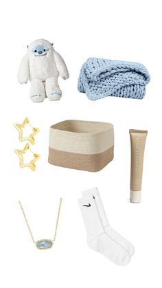 an assortment of items that include a hat, socks, and other things to wear