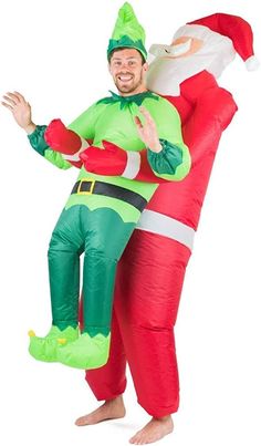 an inflatable santa and elf costume is being carried by a man on his back