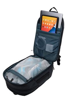 This backpack with a removable roll-top bag is carry-on compliant, making it the perfect bag for air travel. The roll-top bag has a lining the ensures odor, moisture and dirt doesn't spread to the rest of the pack. The carry-on bag has dedicated areas for electronics storage and a water bottle pocket. It is made of 100% recycled fabric and the waxed canvas develops even more character as it ages. Water-resistant Fits most 16" laptops Recycled polyester Imported bluesign®-approved fabric, made wi Multifunctional Standard Backpack For Overnight Trips, Multifunctional Standard Backpack For Travel, Functional Backpack Travel Bag For Overnight Trips, Functional Pocket Backpack Travel Bag For Overnight Trips, Functional Standard Backpack Luggage For On-the-go, Functional Luggage With Anti-theft Pocket For Trips, Functional Backpack For Overnight Trips, Multifunctional Travel Backpack For Overnight Trips, Multifunctional Travel Bag For Overnight Trips