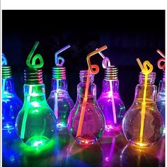 several different colored glass bottles with straws in them and the words ebay written below