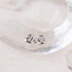 💝Gift-Worthy: Perfect for any occasion 💝 Give your loved one the perfect romantic gift with our Heart Knot Earrings. The stud earring’s knot design is intricate and unique while the diamond charm accent gives it a classic feel. Material: High Quality Solid 925 Sterling Silver Finish: Sterling Silver ∙ 18K Gold Featuring ~10mm Heart Charm Knot Earrings Sold as a pair SKU: RR-ER304 Pave Heart Necklace, Heart Knot, Perfect Gift For Girlfriend, Knot Stud Earrings, Knot Studs, Heart Locket Necklace, Earrings Everyday, Knot Design, Knot Earrings