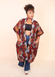 Fit: Loose fit, Casual Fit, Standard Fit. Perfect for average, petite and tall bodies. Can fit multiple sizes. Model is 5'9 wearing size L/XL Description African print kimono jacket (Patterns placement maybe slightly different for each kimono) Loose fit, perfect as a cover up piece About 45 inches long Unlined Open-front style Pockets on the side Keep your look on point during any casual occasion with this African Print Short-Sleeve Kimono Jacket. This lightweight kimono jacket features some sid Fitted Kimono With Kimono Sleeves For Fall, Multicolor Printed Outerwear With Kimono Sleeves, Casual Fitted Kimono With Kimono Sleeves, Fitted Casual Kimono With Kimono Sleeves, Oversized Printed Outerwear With Kimono Sleeves, Casual Fitted Open Front Kimono, Kimono Jacket Pattern, African Kimono, Kimono Styles