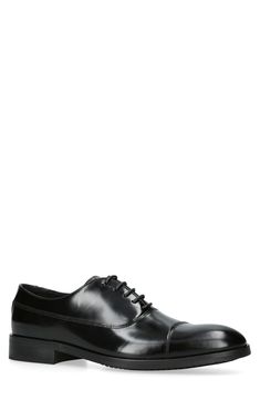 Classic and versatile, this oxford made of high-polish leather features a simple cap toe and a quilted footbed to cushion every step. Lace-up style Cushioned footbed Leather upper/synthetic lining and sole Made in Portugal Fitted Derby With Rubber Heel Cap And Cap Toe, Fitted Cap Toe Derby With Rubber Heel Cap, Classic Fitted Oxfords With Leather Footbed, Classic Cap Toe Oxfords With Leather Footbed, Fitted Derby Shoes With Rubber Sole And Cap Toe, Fitted Cap Toe Derby Shoes With Rubber Sole, Fitted Cap Toe Derby With Rubber Sole, Classic Derby With Rubber Heel Cap And Round Toe, Modern Cap Toe Oxfords With Goodyear Welt