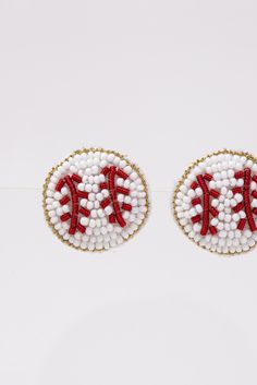 Stand out on your next game day with our fabulous Gia Baseball Beaded Embroidery Stud Earrings. Elevate your look with these detailed handmade beaded embroidery stud earrings. Size Height: 1 in. Quality High Quality Seed bead Embroidery Details, Secured with a comfortable post back. Imported E10015WT Seed Bead Embroidery, Seed Bead Earrings, Elevate Your Look, Bead Embroidery, Embroidery Details, First They Came, Beaded Embroidery, Seed Bead, Game Day