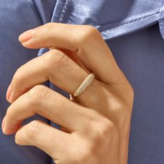 Discover timeless sophistication with our Minimalist Pave Dome Ring. Meticulously crafted, this exquisite piece embodies understated elegance. The sleek and modern design showcases a delicate dome adorned with a graceful array of pave-set cz diamonds, exuding a subtle yet radiant sparkle. - Made in 14k Solid Gold - Decorated with handset white cubic zirconia stone on 14k solid gold- Band Width: 2.43 mm / 0.09 inches- Thickness: 1.49 mm / 0.06 inches- Top Width: 4.34 mm / 0.17 inches -This produc Minimalist Rose Gold Cubic Zirconia Diamond Ring, Elegant Open Ring With Half Eternity, Elegant Open Ring With Half Eternity Design, Elegant Open Ring With Half Eternity Detail, Minimalist Cubic Zirconia Diamond Ring With Pave Setting, Elegant Diamond Stackable Rings With Pave Setting, Elegant Cubic Zirconia Stackable Rings, Minimalist Diamond Ring With Pave Setting For Promise, Elegant Yellow Gold Dome Ring With Pave Setting