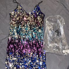 Royal Blue, Black, Silver, Aqua, And Purple Sequin Dress! Perfect For Semi-Formals, Parties, Or A Fun Night Out! Never Worn And Still In Original Packaging. Price Negotiable! Purple Sequin Dress For Party Season, Purple Sequin Dress For Party Season Night Out, Purple Sequin Dress For Night Out And Party Season, Purple Sequin Dress For Night Out Party Season, Purple Mini Sequin Dress For Party Season, Purple Sequin Dress For Night Out, Glamorous Purple Sleeveless Sequin Dress, Multicolor Disco Mini Dress For Evening, Purple Sequin Evening Dress For Summer