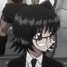 an anime character with black hair wearing glasses and a suit, standing in front of a stone wall