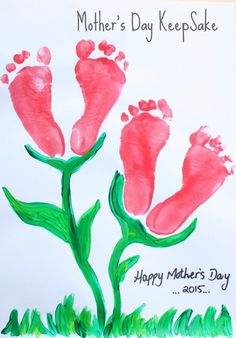 a mother's day card with two feet and flowers