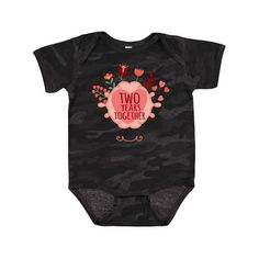 a black baby bodysuit with the words two peas together on it's chest