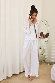 Ready to ship. Our latest addition the day nap pajama, meant to be This Day Naps Bamboo Pajama Set is crafted from 100% bamboo and features stylish ruffle detailing for added flair. The relaxed fit and lightweight fabric provide comfort for a restful and rejuvenating sleep. Breathable and temperature regulating, these pajamas come in either brown or white. Meant to be worn day and night! Featuring bamboo fabric, in gorgeous azo free dyes. Ruffles at the sleeve and the hem, elastic waist, and a s French Pajamas Aesthetic, White Pjs, Silk Pijamas, Feminine Loungewear, White Sleepwear, White Pajama Set, White Cotton Pajamas, Loungewear Aesthetic, Pajama Set White