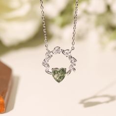 Cue the romance with our stunning Heart’s Desire Moss Agate Necklace. This perfect expression of true love features a natural charm of a wreath-like pendant with a heart-shaped moss agate gem at the center. A cherished keepsake that radiates love from every angle. ✦ 14K White Gold Vermeil (14K white gold plated over a sterling silver base) Bff Rings, Moss Agate Necklace, Moss Agate Jewelry, Magical Stones, Moss Agate Ring, Lucky Stone, White Gold Necklaces, Vermeil Jewelry, Agate Necklace