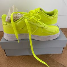 Brand New With Box Size Is 5 Youth/6.5 Women. Neon Patent Leather With White Sole. Yellow Nike Air Force 1 Lace-up For Streetwear, Nike Neon Yellow Sneakers For Streetwear, Neon Yellow Nike Sneakers For Streetwear, Nike Neon Yellow Lace-up Sneakers, Yellow Nike Air Force 1 With Round Toe, Nike Air Force 1 Yellow With Round Toe, Trendy Neon Yellow Sneakers For Streetwear, Trendy Neon Yellow Low-top Sneakers, Neon Yellow Shoes